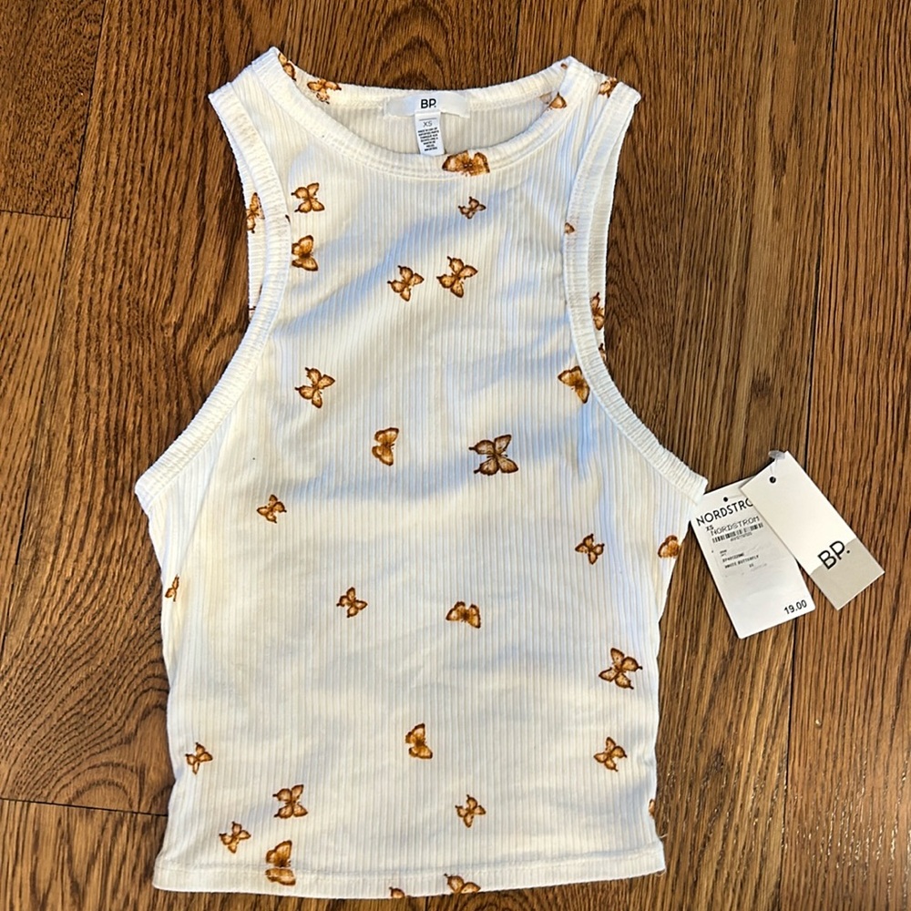 BP Butterfly tank top size XS. Never worn. Still has tags on it.